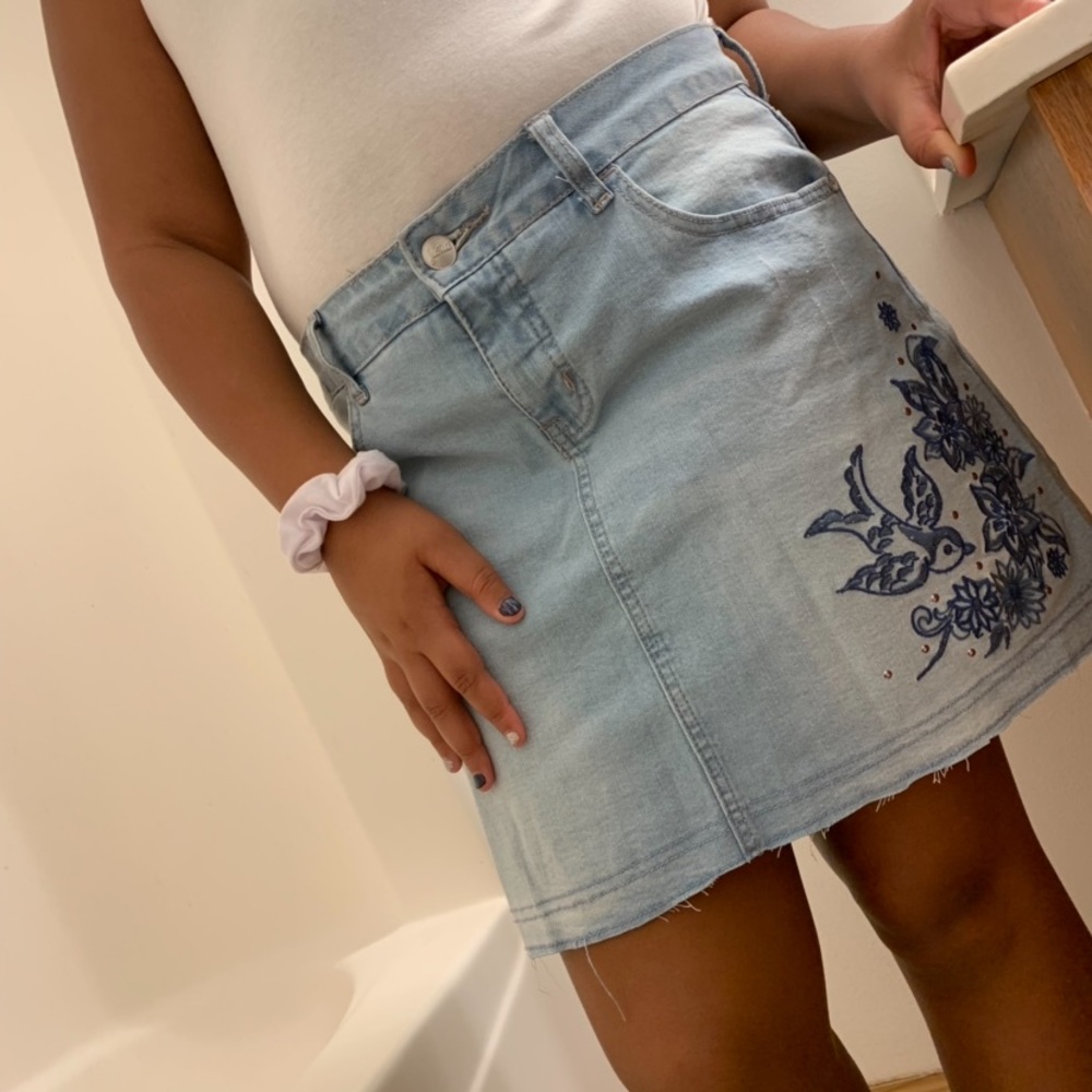 A light blue jean skirt.